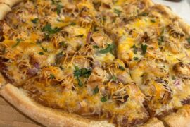 BBQ chicken pizza and a pepperoni pie with store bought dough and cheapo pizza pans