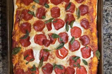 Homemade Thin-Crust Sheet Pan Pizza with Pepperoni and Fresh Basil