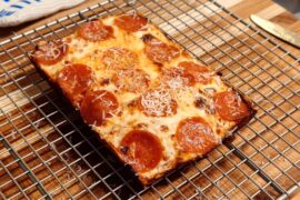 Detroit-style 5x8, using pre-grated, part-skim mozz and sharp cheddar like a heathen. Suck it.