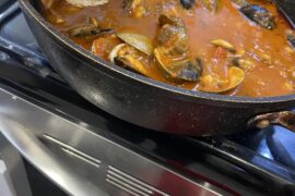 Mussel and clam seafood pasta with home grown Roma tomatoe sauce and basil 🌿 + olive focaccia