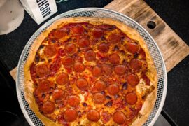 Tried to make a 18 inch pizza in my home oven.