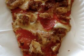 Chicken cutlet with fresh tomato slices