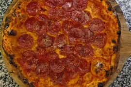 What is the secret to a good NY Pizza. I'm trying and failing. They're always too puffy.q