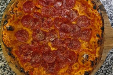 What is the secret to a good NY Pizza. I'm trying and failing. They're always too puffy.q