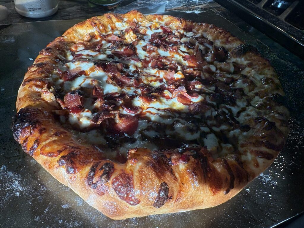 Homemade bbq chicken and bacon pizza.