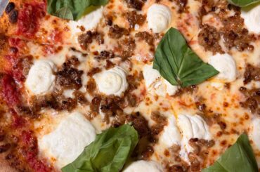 One of my pizzas from tonight, ricotta caramelized onions and basil 🌿 wood fire oven only