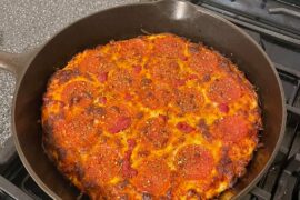Pizza in a cast iron skillet