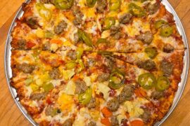 Tavern. Hot Italian sausage. Half giardinara, half jalapeños. Pie cut.