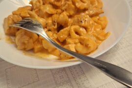 Tortellini filled with cheese in a tomato baded sauce