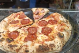 That wood-fired crust though... pepperoni perfection from a local spot in Bangkok.