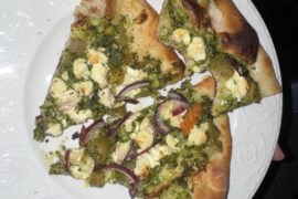 Just whacked it together from a dough recipe seen here. Pesto, feta, red onion, and gardiniera peppers. Devoured it. Second try in three weeks on a steel in a 550* oven