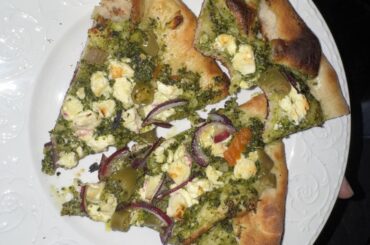 Just whacked it together from a dough recipe seen here. Pesto, feta, red onion, and gardiniera peppers. Devoured it. Second try in three weeks on a steel in a 550* oven