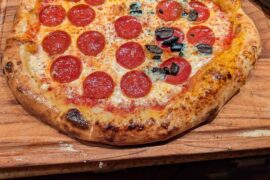 Been giving NY a try. 16" 65% hydration poolish dough