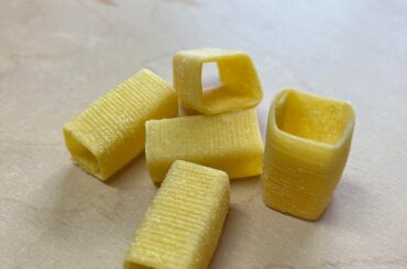 Mezze Rigatoni Quadri with tomato sauce,sweet broccoli, toasted breadcrumbs, and pecorino