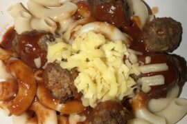 Elbows and fried meatballs with marinara sauce and grated cheese 🍝