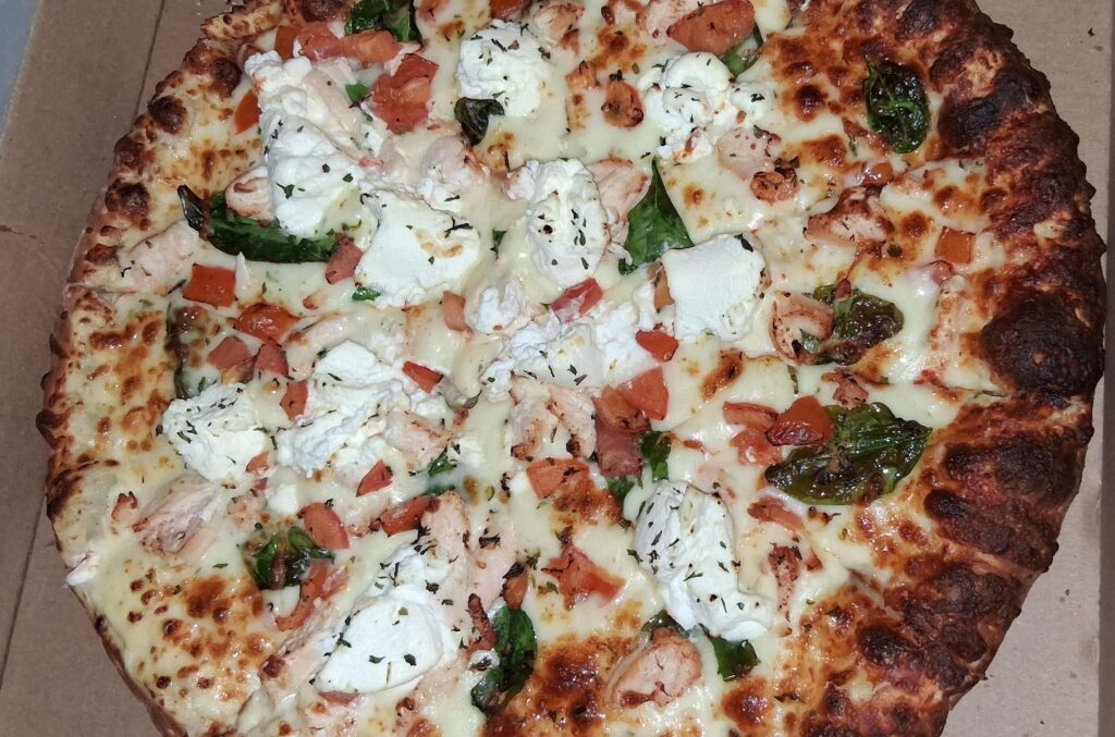 I prefer a white pizza over marinara. I think she's beautiful.