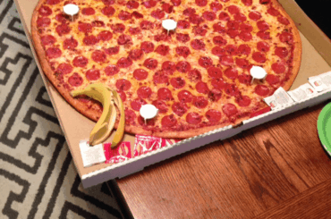 Giant pizza from a WONDERFUL local place.  (Banana for scale)