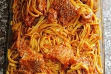 Pasta with sauce and meat for dinner.