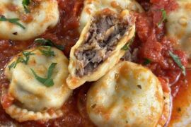 Meat sorrentinos with Bolognese sauce