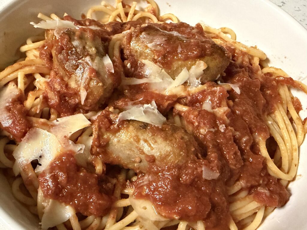 Spaghetti with Italian sausage in a spicy tomato sauce