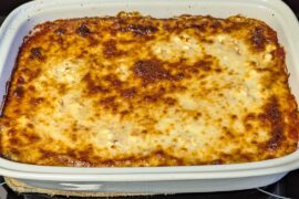 Baked penne with a butternut squash and spinach filling topped with feta and mozzarella cheese