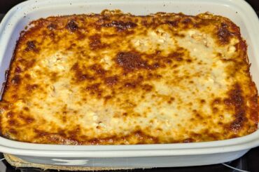 Baked penne with a butternut squash and spinach filling topped with feta and mozzarella cheese