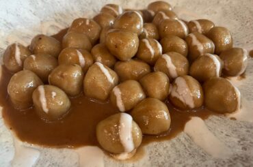 Ossola style gnocchi (Gnocchi All'Ossolana) made of chestnuts served with demi glace and cheese fondue.