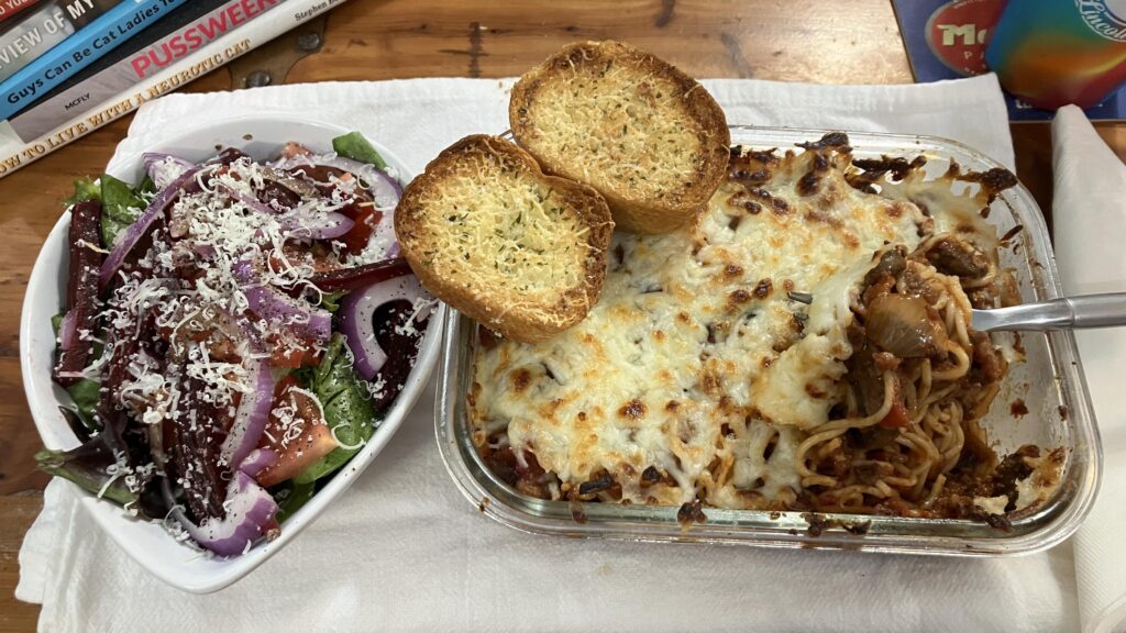 Not difficult, yet delicious. Baked angel hair with spicy and sweet sausage, beef, plus sautéed mushrooms.