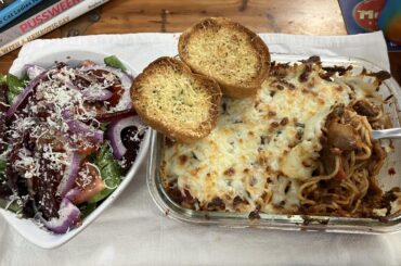 Not difficult, yet delicious. Baked angel hair with spicy and sweet sausage, beef, plus sautéed mushrooms.