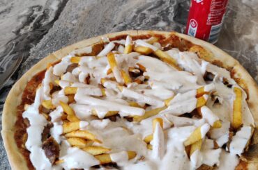Kebab pizza from the best place in my town. (Extra sauce)
