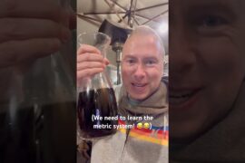 First bite of pizza in Italy - and plenty of red wine to go with it! 😂