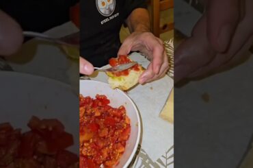 Italian father makes bruschetta bread