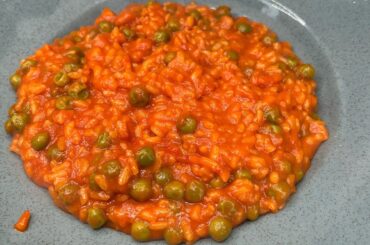 Risotto with gravy and peas. 🫛❤️🌟#pasta #italiancuisine #cucinelli #food #pasta #italiancuisine