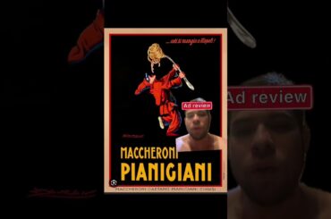 Italian man eating big fork of spaghetti