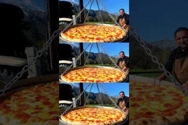 Village style giant Pizza making with elevator #cooking #villagecooking #wilderness #shorts