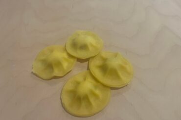 Caramelized pears,ricotta and parmigiano ravioli with a butter sauce