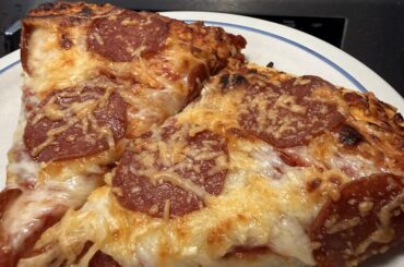 Made from scratch. Baked at 500 for 17 in a regular oven. I ain’t mad about it.