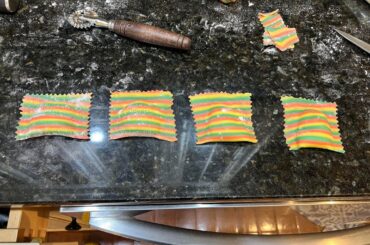 Tri color ravioli w/ ricotta & pear filling