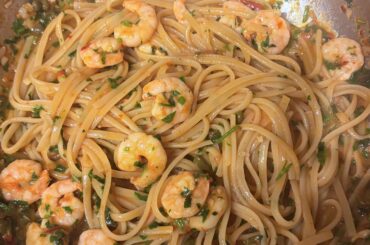 Linguine with scampi, fresh tomato, capers, garlic and parsley