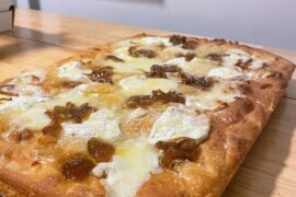 White square with fig jam and caramelized onions