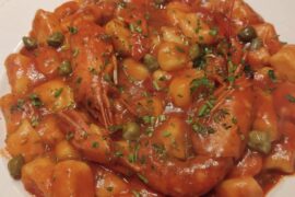 Gnocchi with fresh King Prawns, capers, and a touch of parsley. Pure Italian comfort food! [OC]