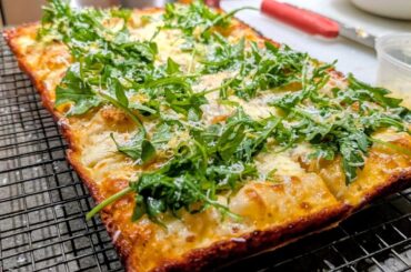 Detroit style w/ caramelized shallot, pecorino black pepper cream sauce, arugula and lemon zest