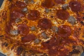 Definitely not burnt sausage and pepperoni Made in a chefman electric pizza oven.