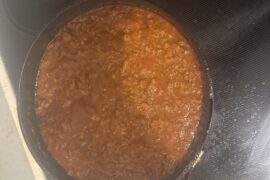 Lazy Sunday sauce. Meatball mix meat, but didn’t want to make meatballs and what was country style pork ribs. At least it’s been cooking for 6 hours. I had a parm rind in it and ate it.  Does anyone else eat the parm rind?