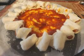 Hot dog and cheese stuffed crust pizza