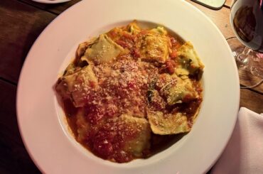 Beef ravioli with tomato sauce and red wine