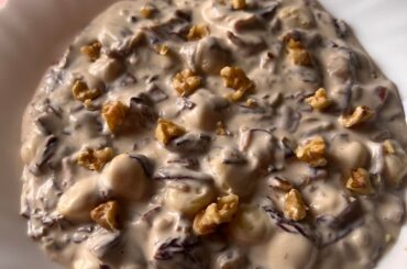 Gnocchetti with speck, radish, mascarpone cheese and nuts as decoration