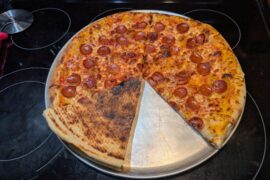 work in progress NY style, 550 electric oven, pizza steel, started on a screen