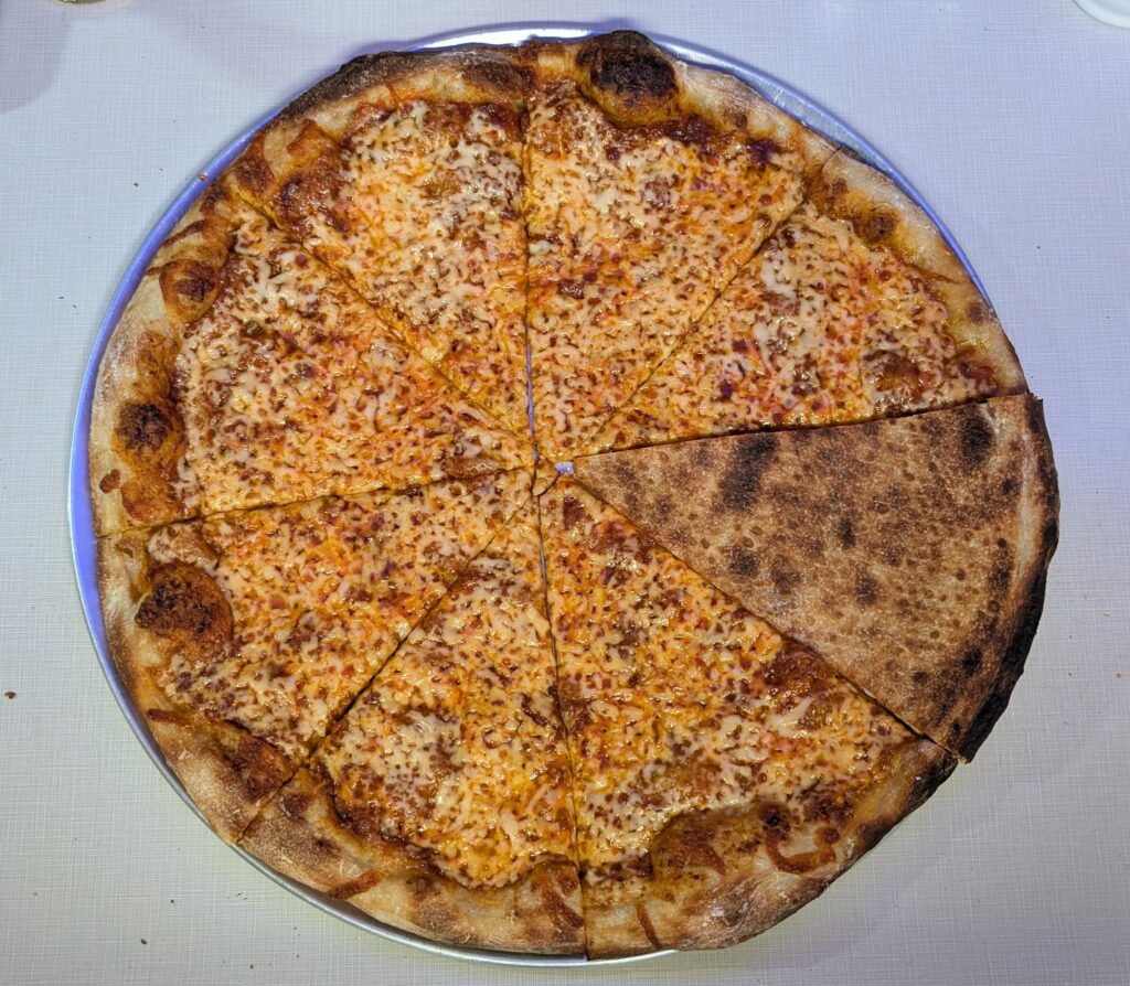 Some NY style regular pizza with a 4 hr slow cooked sauce.