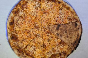 Some NY style regular pizza with a 4 hr slow cooked sauce.